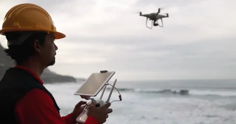 Man engineer pilot flying with drone Stock Footage 145430846