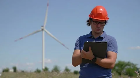 Man engineer working in wind turbine electricity industrial Stock Footage 160729574