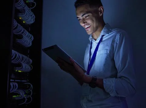 Man, engineering and tablet in data center or server room inspection, system Stock Photos