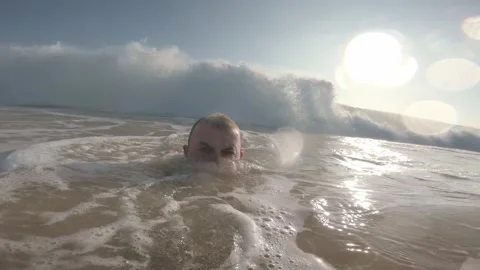 Man Engulfed by Breaking Wave in Mirissa Beach Surf, Sri Lanka Stock Footage 340856378