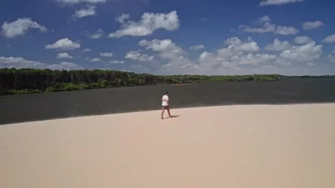 Man Enjoy Solitude on Desert and Lake - Barreirinhas, Brazil Stock-Footage 331517357