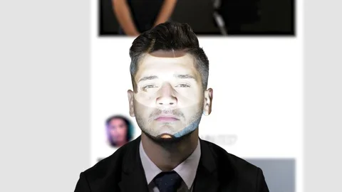 Man enjoying himself while sitting in front of a projector with social media  Stock Footage 86426103