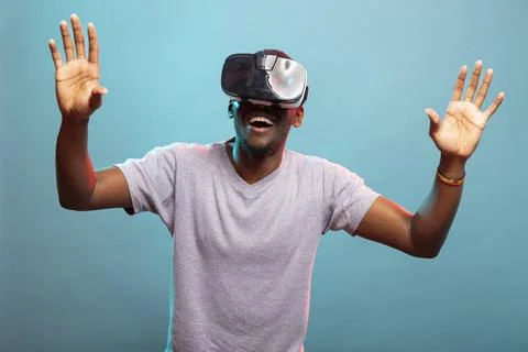 Man enjoying virtual reality simulation Stock Photos
