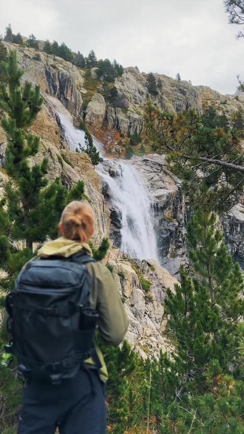 Man Enjoying Waterfall View Stock Footage 320117288