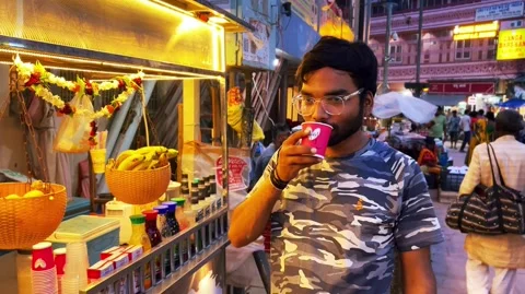 Man enjoys a refreshing Fruit Juice Stock Footage 285422959