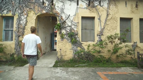 Man entering the building Stock Footage 85775361