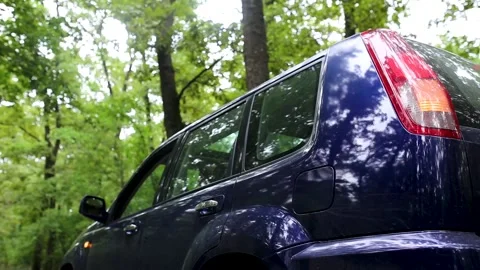 Man entering a car, starting engine turn off light indicators and start movement Stock Footage 207464131