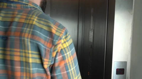 Man entering elevator and leaving Stock Footage 160743048