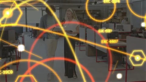 Man entering left with bag and woman holding tablet, sharing office data while Stock Footage 333631865
