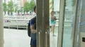 Man entering office center, came for job interview, looking curiously around HD Footage