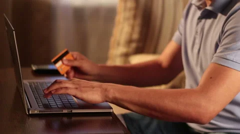 Man entering password  while online shopping and using laptop. Stock Footage 65402851