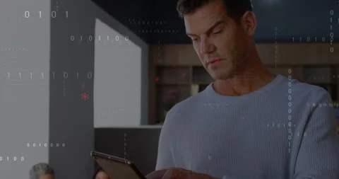 Man entering tech lounge and tapping tablet screen, generating floating code for Stock Footage 315531086