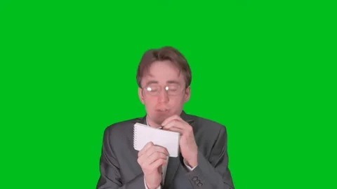 A man enthusiastically writes notes to a paper notebook from a business guru Stock Footage 88444433