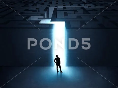 Man at the entrance to a maze Stock Photos
