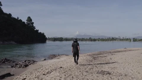 Man at estuary Video stock 259252876