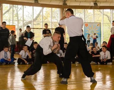 Man evades enemy attack Stock Photos