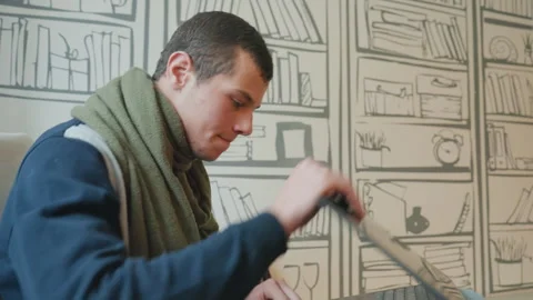 Man examines display. Curious person closely inspects information on laptop Stock Footage 338990159