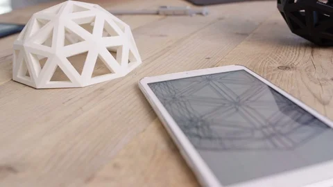 Man examining 3D model and looking sketch on computer in the modern office Stock Footage 106749758