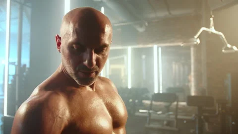 Man Executing Simultaneous Bicep Curls with Two Dumbbells Stock Footage 269211921