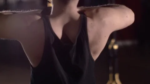 Man exercise at a gym by using bungee training Stockbeeldmateriaal 77326580