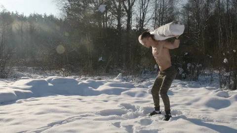 Man exercise with log, timber outdoors at snow Stock Footage 147223240