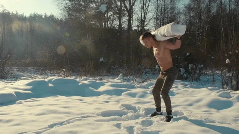 Man exercise with log, timber outdoors at snow. Video stock 148497052