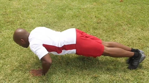 Man Exercise in the park - slow motion Stock Footage 955018