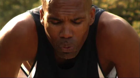 Man exercising and doing press-ups Stock Footage