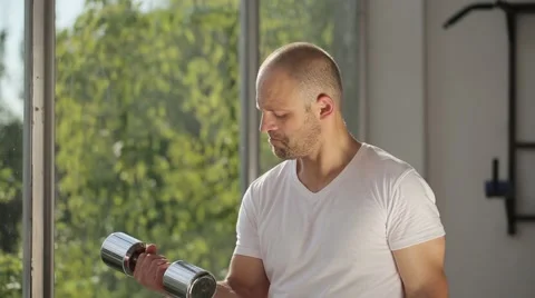 Man Exercising with Arm Weights Video stock 51825339