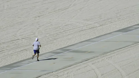 Man exercising at the beach Stock Footage 36105088