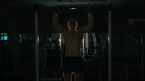 Man exercising cross training arms on workout bar gym , lowlight 스톡 동영상 68414637