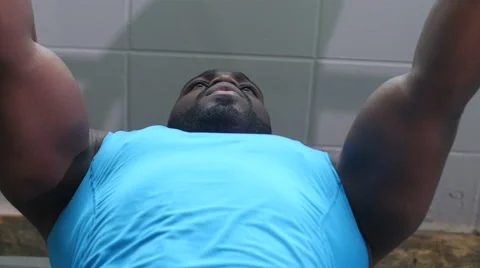 Man Exercising, Doing the Bench Press in the Gym, Steadicam Stock Footage 49101077