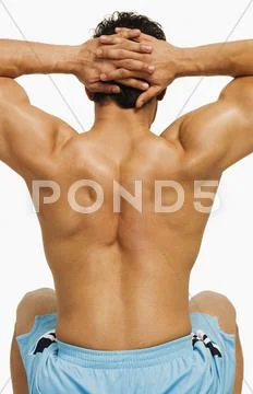 Man exercising on a fitness ball Stock Photos