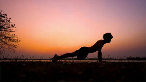 Man exercising holding hands on floor and doing push-up exercise. Stock Footage 149580795