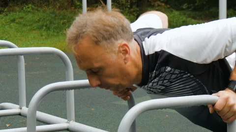 A man is exercising at an open pitch Video stock 66543139