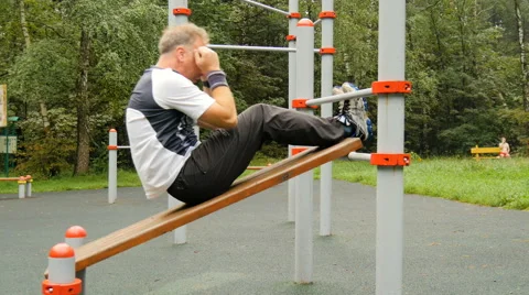 A man is exercising at an open pitch Video stock 66543590