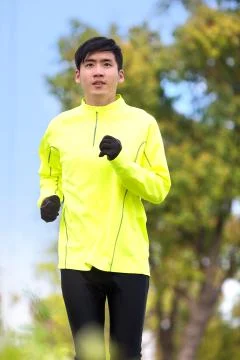 A man is exercising outdoors Stock Photos