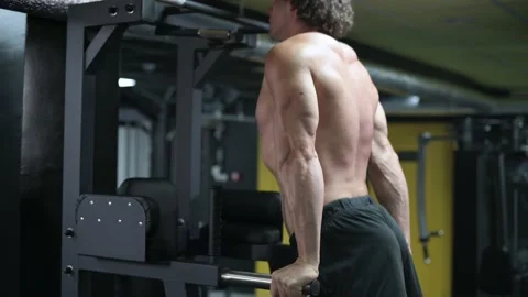 Man exercising on parallel bars. 스톡 동영상 160005993