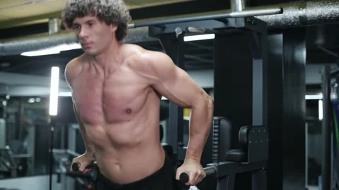 Man exercising on parallel bars. Stock Footage 160938866