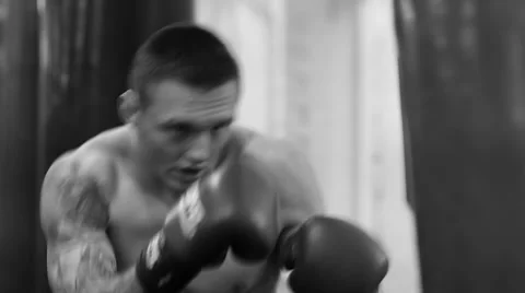 Man Exercising With the Punching Bag Stock-Footage 60139644