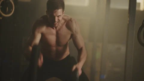 Man exercising with ropes Stock Footage 236184822