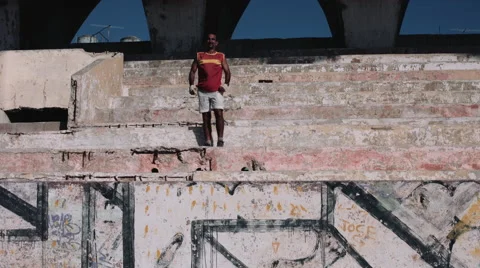 Man exercising at stadium Stock Footage 53539968