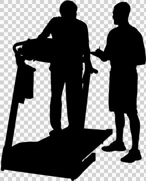 Man exercising on treadmill by trainer Stock Photos