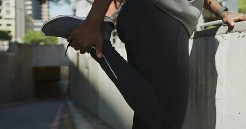 Man exercising in an urban setting Stock Footage 118617525