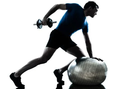 Man exercising weight training workout fitness posture silhouette Stock Photos