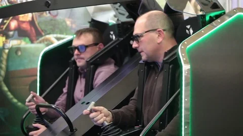 Man on Exo Skelet interactive gaming attraction in Moscow, Russia Stock Footage 80897853