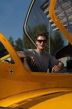 A man experiences the first sensations of flying on an airplane. First flying Stock Photos