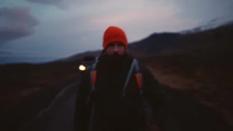 Man Experiencing Car Breakdown in Remote Icelandic Landscape Stock Footage 307360667