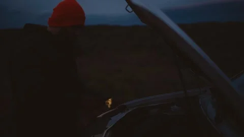 Man Experiencing Car Breakdown in Remote Icelandic Landscape 스톡 동영상 307360733