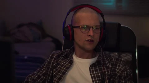 Man Experiencing Gaming Addiction and Frustration at Computer Stock Footage 342022893